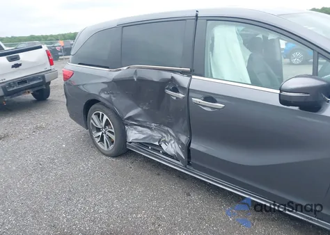 2023 Honda Odyssey Touring z USA, uszkodzony, nr VIN 5FNRL6H87PB019264